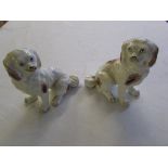 A pair of early 19th Century Staffordshire spaniels