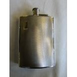 Silver engine-turned hip flask