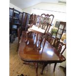 12 dining chairs in Chippendale manner, and pedestal dining table