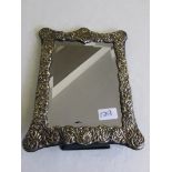 Silver embossed, framed mirror