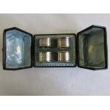 Cased set of four silver napkin rings