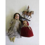 Two dolls and a mounted Lifeguard.