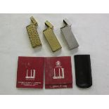 Three Dunhill lighters