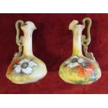 Pair of Alexandra porcelain floral and gilded ewers