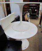 A pair of white melamine tulip type tables