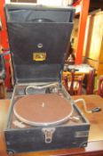 An HMV leatherette covered table top gramophone