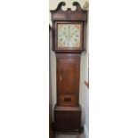 A 19th century oak longcase clock, the broken swan neck pediment above square columns,