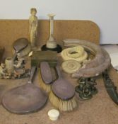 A silver backed part dressing table set together with a Japanese ivory figure,