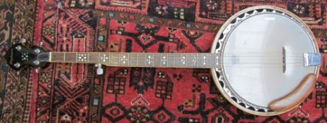 A Palmer five string banjo with mother of pearl inlay,