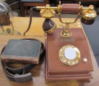 A German "Gottmituns" WWII belt buckle together with a telephone and book "Collection of British