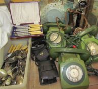 Three green bakelite telephones together with a partial candlestick telephone, cameras,
