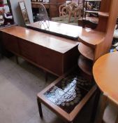 A 1960s/70s teak sideboard, together with a tiled top coffee table, a teak standing corner cupboard,