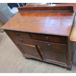 A 20th century mahogany mirror back sideboard together with a walnut dressing chest