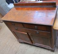 A 20th century mahogany mirror back sideboard together with a walnut dressing chest