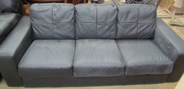 A black leather three seater settee