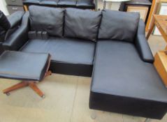 A black leather three seater settee with day bed,