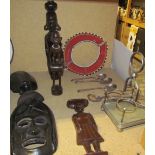 A Maasai necklace together with five African carved figures,