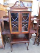 An Edwardian mahogany side cabinet,