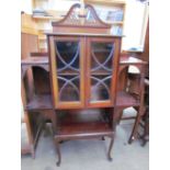 An Edwardian mahogany side cabinet,