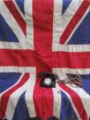 A Bakelite telephone and a Union flag