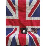 A Bakelite telephone and a Union flag