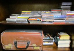 A collection of CD's, DVDs,