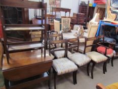 A set of six brass inlaid Regency style mahogany dining chairs together with a standing corner