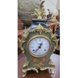 An Italian marquetry decorated mantle clock, with gilt metal mounts,