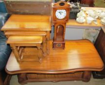 An Edwards of Monmouth oak coffee table together with a nest of three oak tables and a Glengoyne