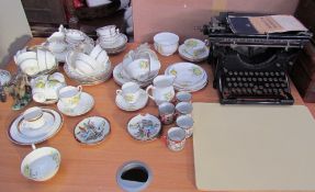 A Bell china part tea service together with other part tea set, a typewriter, suitcases, Thermos,