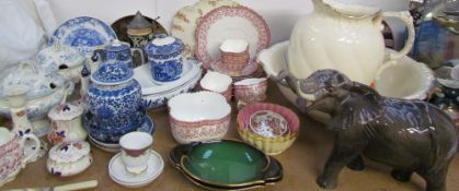 A Beswick elephant, tureen, dressing table set,