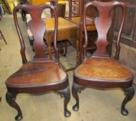 A pair of George III mahogany dining chairs,