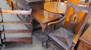 An Edwardian corner occasional table with a drop flap together with a hanging shelves