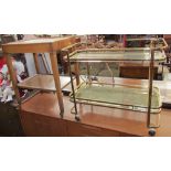 A teak trolley together with a brass and glass tea trolley