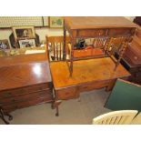A 20th century walnut dressing table together with an oak side table,