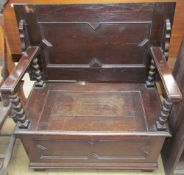 A 20th century oak monks bench