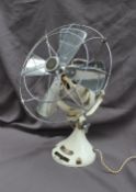 A Veritys 'The new 12" New Orbit Fan' in white,