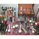 A large collection of Gentleman's wristwatches including Timex, Sekonda, T&J,