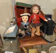 Two Nora welling dolls, binoculars,