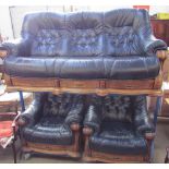 An Edwards of Monmouth oak framed blue leather three piece suite,