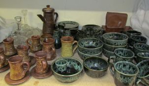 A studio pottery part tea set together with a pottery part coffee set and a glass part dressing