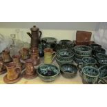 A studio pottery part tea set together with a pottery part coffee set and a glass part dressing