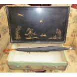 A chinoiserie lacquer decorated tray together with an umbrella,