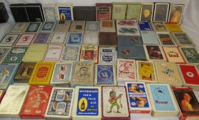 A large collection of playing cards including Gold Flake, Park Drive, Test pilot, Guinness, Sooty,