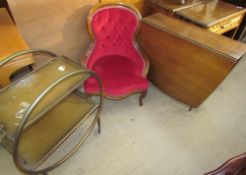 An Art Deco style tea trolley together with a Victorian style nursing chair and a gateleg dining