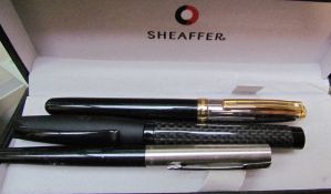 A Sheaffer fountain pen with a medium nib together with a Faber Castell fountain pen and a fountain