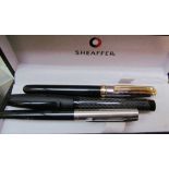 A Sheaffer fountain pen with a medium nib together with a Faber Castell fountain pen and a fountain