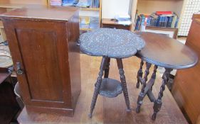 An Indian carved occasional table together with a pot cupboard and an oak occasional table