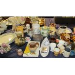 A continental porcelain table centrepiece together with meat plates, jugs,