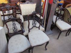 An Edwardian mahogany part salon suite, comprising a Gentleman's chair,